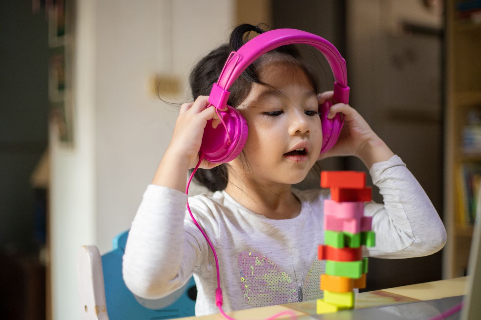 Asian girl learning from headphone and laptop, Happy girl learn